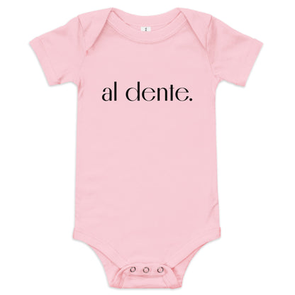 Product display image of the "Al Dente" baby onesie in pink cotton, laid flat on a white background. Chunky Deli product image.