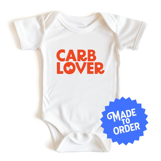  Chunky Deli product image: Natural-colored "Carb Lover" onesie, 100% cotton with envelope shoulders and three-snap closure, laid flat on a white background.