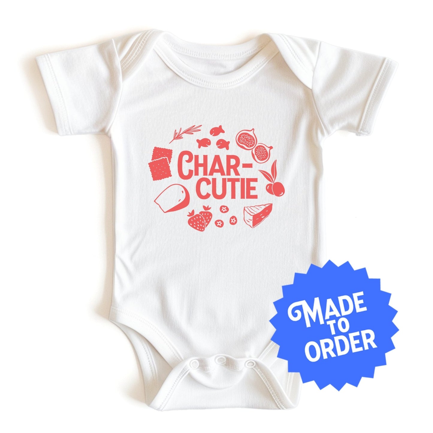 Chunky Deli product image: Natural-colored "Charcutie" onesie, 100% cotton with envelope shoulders and three-snap closure, laid flat on a white background.