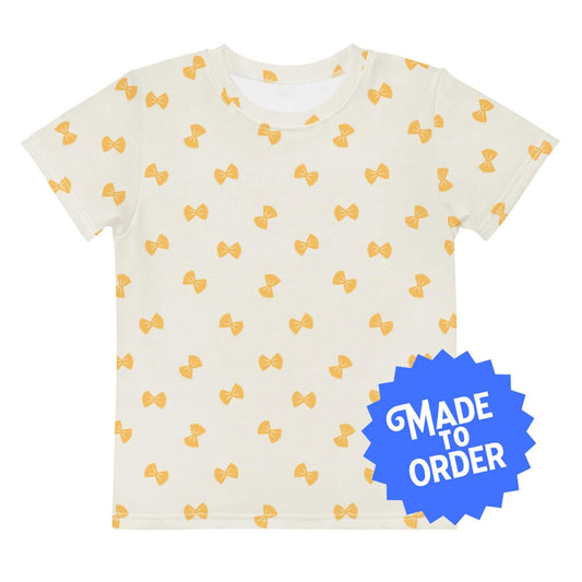 Chunky Deli product image: Kids' and toddler t-shirt with an all-over print of farfalle pasta illustrations scattered on the front and back. The t-shirt has short sleeves, a crew neck collar, and a unisex cut.