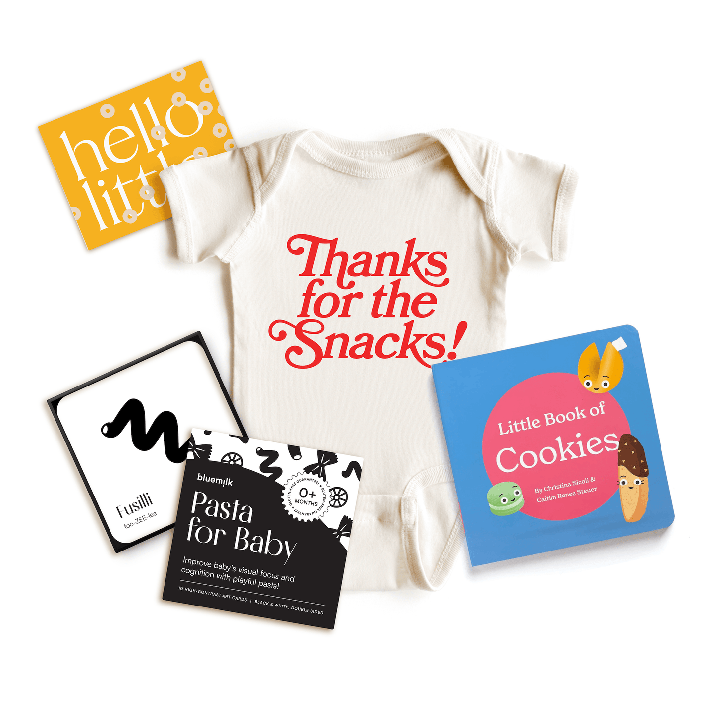 Chunky Deli product image: Hungry Baby Gift Bundle, including the "Thanks for the Snacks" onesie, "Little Book of Cookies" board book, "Pasta for Baby" black and white high-contrast art cards, and the "Hello Little" postcard, all grouped together on a whi