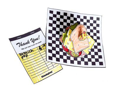 Chunky Deli product image: Assembled Mini Sandwich Printable, with colored and cut-out sandwich ingredients stacked on deli paper, alongside a yellow order slip, all clustered together on a white background.