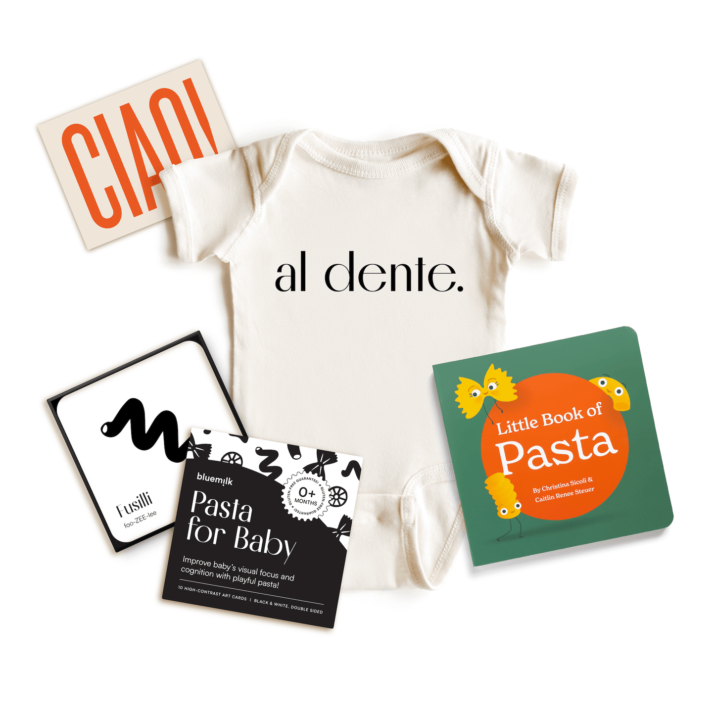 Chunky Deli product image: Flat lay of the Pasta Baby Gift Bundle, including an "Al Dente" 100% cotton onesie, "Little Book of Pasta," "Pasta for Baby" black and white art cards (visual stimulation and sensory play toy), and a gift note reading "Ciao!" Al