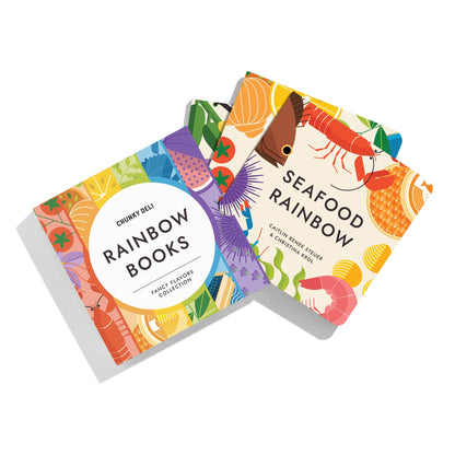 Box set of three "Rainbow" board books for children aged 0-4, with books titled "Gourmet Rainbow," "Spice Rainbow," and "Seafood Rainbow," fanned out to display colorful covers against a white background.  Product display image. Chunky Deli