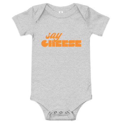 Chunky Deli product image: Grey-colored "Say Cheese" icon onesie, 100% cotton with envelope shoulders and three-snap closure, laid flat on a white background.